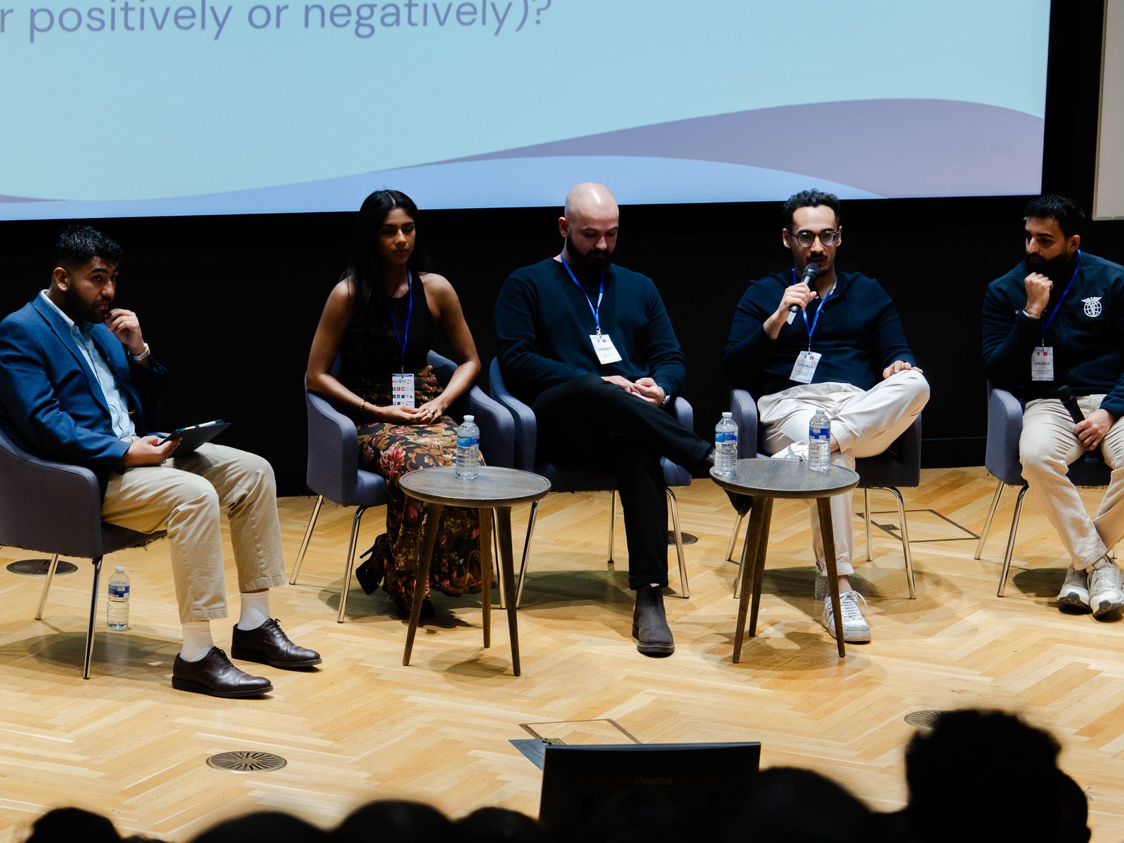 A panel discussion on stage at MEDNEX, photographed by Kyros